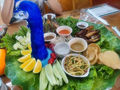 -沐毫傣泐云南菜孔雀宴•手抓饭傣味烧烤(曼听公园店)