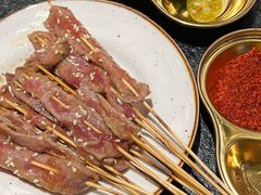 湿辣牛肉-何妹湿辣牛肉·粤式烧烤砂煲(桂雅路店)
