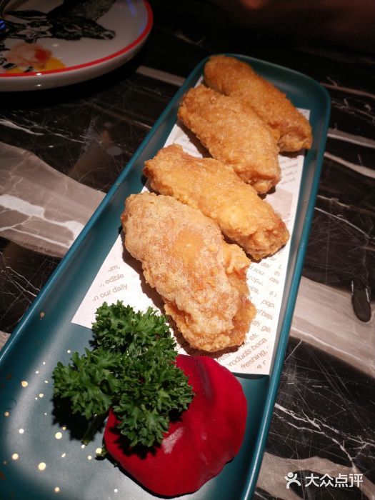 新白鹿餐厅(虹桥南丰城店)蛋黄鸡翅图片