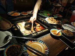 -老牌坊云南鱼豆花火锅(哈西万达店)
