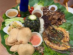 -沐毫傣泐云南菜孔雀宴•手抓饭傣味烧烤(曼听公园店)