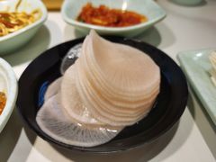 腌萝卜片-猪啊牛呀羊啊铜盘烤肉(正大广场店)