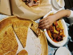 馕坑芝麻馕-巴扎美食·新疆菜·西域歌舞表演餐厅(新疆大厦店)