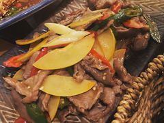 酸木瓜炒牛肉-紫滇源云南生态菜(丹凤街店)