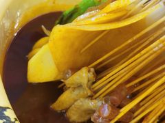 -拈签一笑黄牛肉辣卤串串