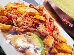 馕丁炒肉-巴依兄弟西域美食(机场店)