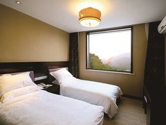 豪华山景房-鲜屋惟曼酒店(西湖宋城九溪店)