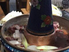 -毛辣果·贵州红酸汤牛肉火锅(西单店)