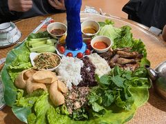-沐毫傣泐云南菜孔雀宴•手抓饭傣味烧烤(曼听公园店)