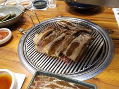 秘制肥牛-草家酱蟹炭火烤肉店(珲春南路一店)