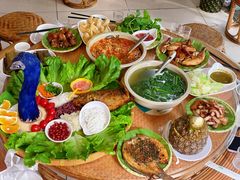 -沐毫傣泐云南菜孔雀宴•手抓饭傣味烧烤(曼听公园店)