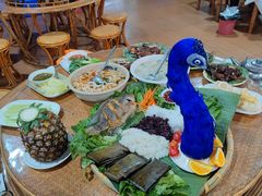 -沐毫傣泐云南菜孔雀宴•手抓饭傣味烧烤(曼听公园店)