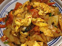 年糕炒鸡蛋-云海肴·汽锅鸡·云南菜(美罗城店)