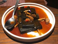 猴头菇鲍汁瑶柱扒制黑豆腐-肴约·花园式餐厅(湖里店)