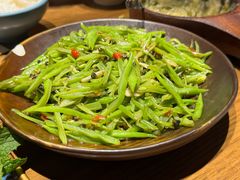 韭菜花炒扁豆丝-金孔雀德宏傣味餐馆(魏公村店)