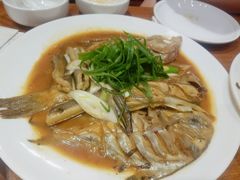 家焖杂拌鱼-日月昇海鲜码头(开发区五彩城店)