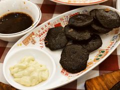 墨汁煎墨鱼饼-吉源大排档·鱼生·海鲜(烧烤彩印厂店)