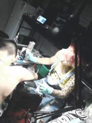 iphone_upload_pic-异族刺青创意工作室