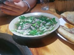 碗碗嫩牛肉翘脚-大众跷脚牛肉馆·非遗传承单位(峨眉山店)