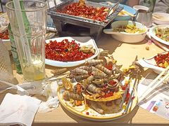 爆炒钉螺-街角等你.大连海鲜烧烤.经典铁板海鲜串(西安路店)