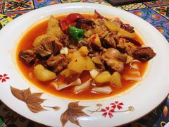 沙湾大盘鸡-西域盛宴烧烤新疆菜清真餐厅(古美店)