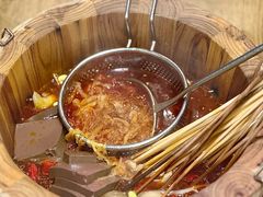 麻辣涮毛肚锅-聚串门儿·东北烧烤(信义坊店)