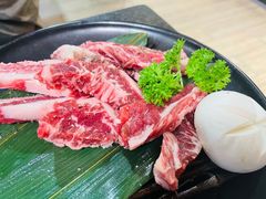 极品浇汁肥牛肋条-草家酱蟹炭火烤肉店(珲春南路一店)