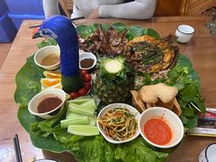 -沐毫傣泐云南菜孔雀宴•手抓饭傣味烧烤(曼听公园店)