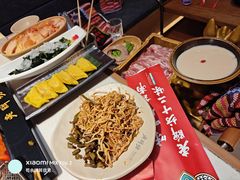 -老牌坊云南鱼豆花火锅(哈西万达店)