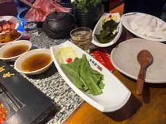-老牌坊云南鱼豆花火锅(哈西万达店)