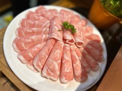 -明何记涮牛肚(品牌首店隋唐植物园南门古城路店)