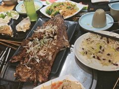 -明何记涮牛肚(品牌首店隋唐植物园南门古城路店)