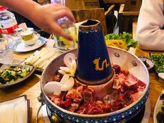 -毛辣果·贵州红酸汤牛肉火锅(西单店)