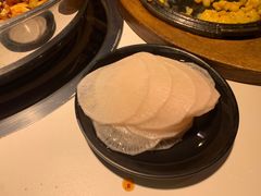 腌萝卜片-猪啊牛呀羊啊铜盘烤肉(正大广场店)