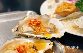 Signature Garlic Roasted Oysters