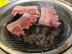 -围炉肉舍•炭烤活鳗•丹东海鲜烤肉(步行街店)