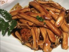 梭子蟹炒年糕-卯时·龙光雅宴·精致锡帮菜(惠山古镇店)