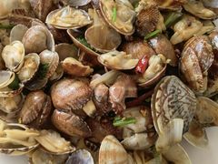 辣炒蛤蜊-1910老鲁味海鲜·戳子肉·青岛菜(金沙滩店)