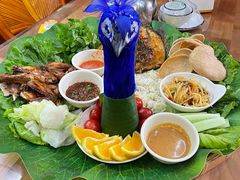 -沐毫傣泐云南菜孔雀宴•手抓饭傣味烧烤(曼听公园店)