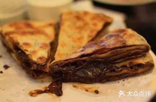 热乎乎的糖饼一端上桌就让人特别欲罢不能