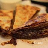 热乎乎的糖饼一端上桌就让人特别欲罢不能