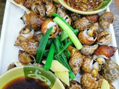 葱姜炒花螺-贞姨美食·老字号海鲜大排档