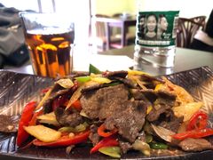 酸木瓜炒牛肉-紫滇源云南生态菜(丹凤街店)