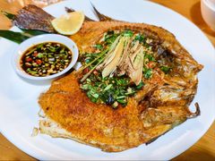 烤罗非鱼-蜗牛的家旅行主题云南菜餐厅.小酒馆(护国寺店)