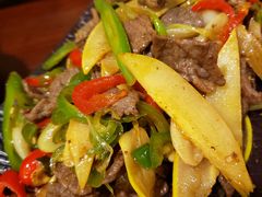 酸木瓜炒牛肉-紫滇源云南生态菜(丹凤街店)