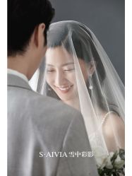 -雪中彩影婚纱摄影·微光艺术中心