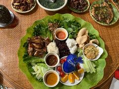-沐毫傣泐云南菜孔雀宴•手抓饭傣味烧烤(曼听公园店)