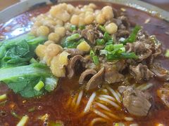 泡椒鸡杂酸辣粉-丁丁猫重庆小面(徐州路店)