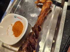特色烤羊小腿-草原饭店火锅