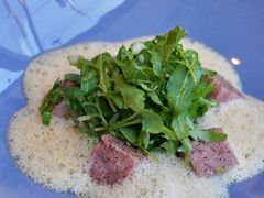 Lyonnais sausage with pistachio white beans puree -Lugdunum Bouchon Lyonnais